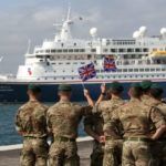 solders welcoming veterans to the port of Poole